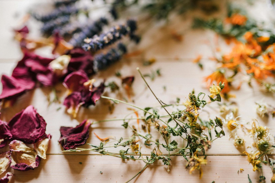Dry your own herbs for tea, like these herbs on a cutting board. 