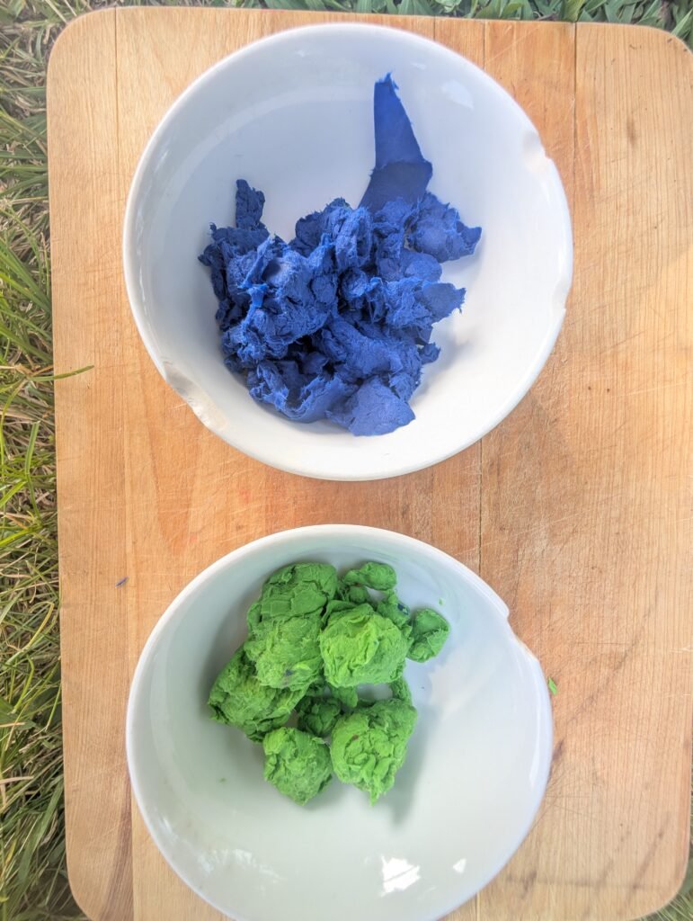 crumbled up wet paper for garden seed bombs